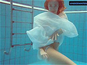 red-haired Diana super-steamy and naughty in a white dress