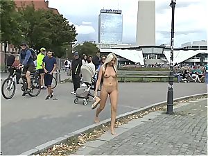 blonde Czech nubile demonstrating her sizzling figure nude in public